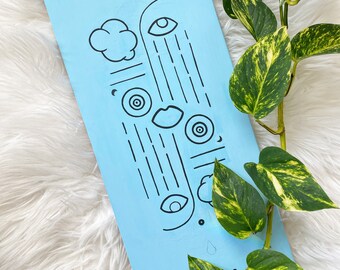 Light Blue Abstract Skateboard Art – Symmetrical Linework Acrylic Painting on Hanging Deck