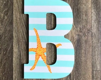 Estrella de mar rayada + tu monograma