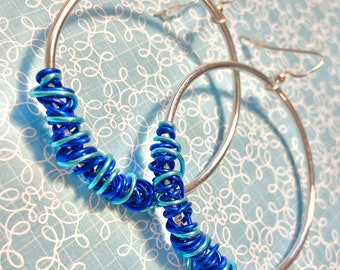 Aros de persuasión de cristal azul