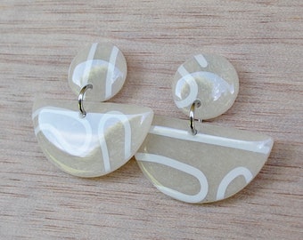 Free shipping within Australia! Handmade polymer clay dangle earrings in translucent and white with a resin finish