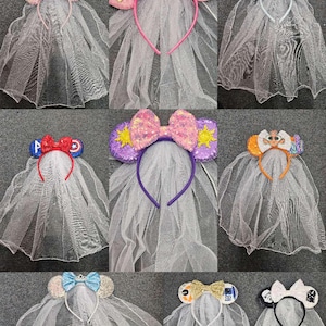 May include: A set of ten white tulle veils with various character-themed headbands. The headbands feature different Disney characters, including Mickey Mouse, Minnie Mouse, princesses, and superheroes. The veils are attached to the headbands and are made of a soft, sheer fabric.