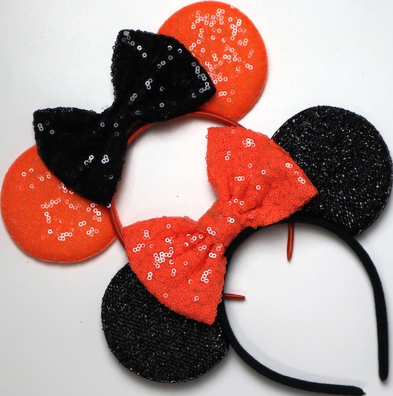 Disney Parks Diadema de Halloween con orejas de lentejuelas naranjas y lazo  negro de Mickey Minnie Mouse