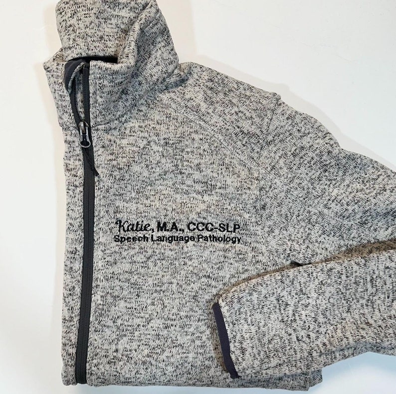 Personalized sweatshirt for slp speech language pathologists. Add your name, credentials, title or department to this full zip sweatshirt for men and women with pockets.