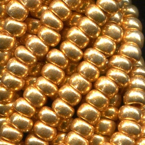 10/0 Gold Metallic #18389 - Preciosa Czech Seed Beads – 2.3 mm Glass Rocailles - 1/4/8 Hanks-1/2 Kilo (12 Hanks).