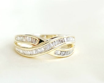 14kt yellow gold with baguette cut diamonds  ring