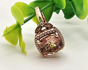 14kt Rose gold diamond and morganite ring.