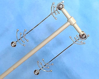 18kt  white gold contemporary diamond dangling earrings.