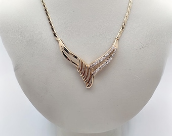 14kt yellow gold diamond fancy necklace.