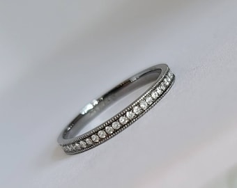 14k black gold eternity diamond band.