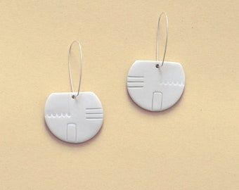 Porcelain earrings - tool marks