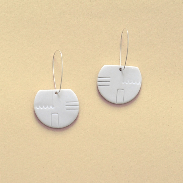 Boucles d'oreilles en porcelaine - marques d'outils