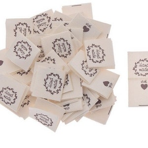 25 Square Fabric Labels with Leaves and "Handmade" writing in Cream / Ecru and Brown writing 20x20mm