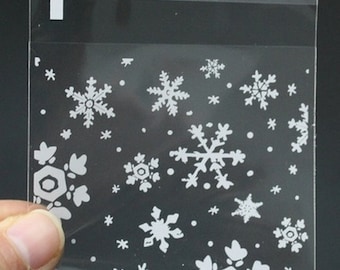 24/50 Small bags self adhesive plastic Transparent with  Snowflakes White 10x7cm (HxW)
