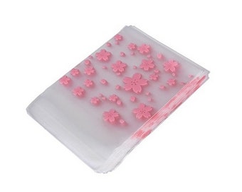 50 Small bags self adhesive plastic Transparent with Pink Flowers  10x7cm - 13x8cm (HxW)