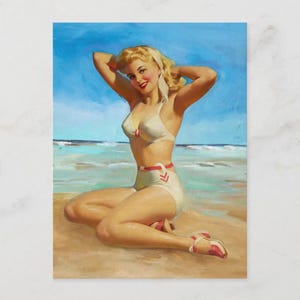 May include: A vintage-style illustration of a person with blonde hair kneeling on a sandy beach. The person wears a white two-piece swimsuit with red trim and chevron details, and red sandals, set against a backdrop of blue ocean and sky.
