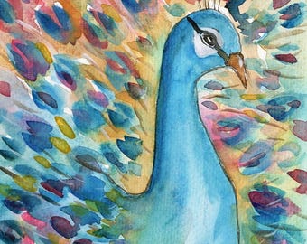 May include: Watercolor painting of a blue peacock with its feathers spread out in a colorful array of blues, greens, yellows, and pinks.