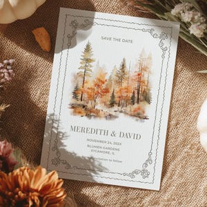 May include: A rectangular Save the Date card featuring a watercolour forest illustration with orange and brown trees. The text reads SAVE THE DATE, MEREDITH & DAVID, NOVEMBER 24, 202X, BLUMEN GARDENS, SYCAMORE, IL, and Formal invitation to follow.