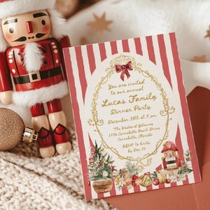 May include: A rectangular invitation card with red and white vertical stripes, featuring a gold ornate frame, a red bow, and Christmas illustrations. The text reads: You are invited to our annual Lucas Family Dinner Party, December 18th at 7 pm.