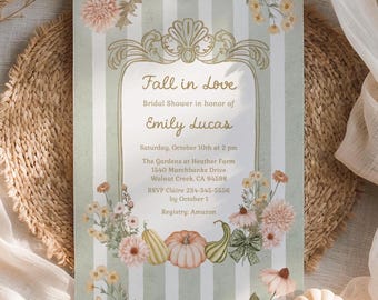 May include: A rectangular bridal shower invitation card featuring a sage green and white vertical striped background. The center displays a gold ornate frame with the text Fall in Love, Bridal Shower in honor of Emily Lucas, Saturday, October 10th at 2 pm, The Gardens at Heather Farm, 1540 Marchhanks Drive, Walnut Creek, CA 94598, RSVP Claire 234-345-5556 by October 1, Registry: Amazon, surrounded by illustrations of pumpkins and flowers.