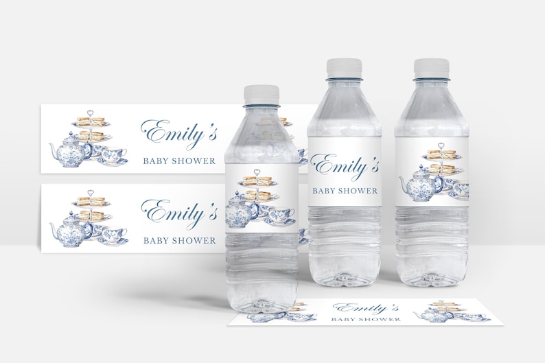 May include: Water bottle labels with a blue and white teapot, teacups, and pastries on a tiered stand. The labels say "Emily's Baby Shower".