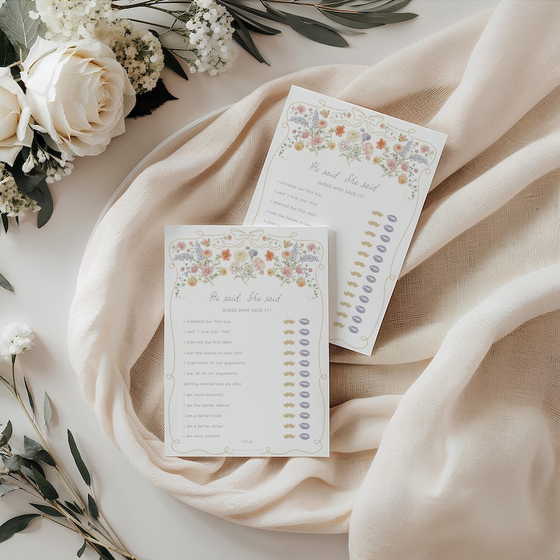 May include: Two printable game cards with a floral design. The cards are titled "He said, She said" and feature a list of questions about a couple's relationship. The cards are perfect for a bridal shower or wedding.