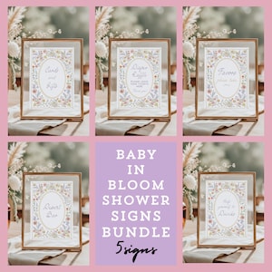 May include: Five printable signs for a baby shower with a floral theme. The signs are in gold frames and have text that says "Cards and Gifts", "Diaper Raffle", "Favors", "Dessert Bar", and "Help yourself to drinks".