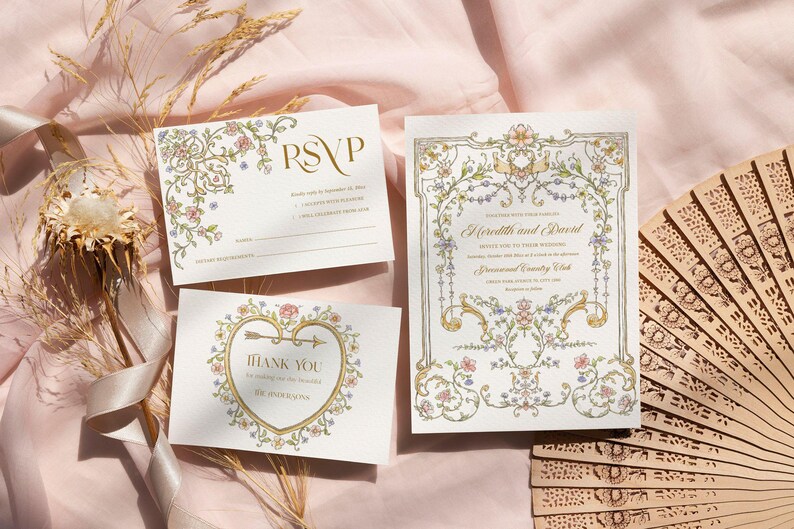 May include: Wedding stationery set featuring an invitation, RSVP card, and thank you card with floral and gold accents. The invitation reads "Meredith and David" and includes event details. A wooden fan is in the background.