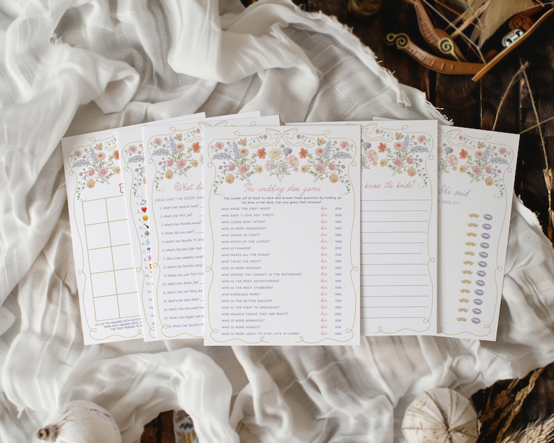 May include: A set of printable wedding shower games with floral illustrations. The games include "Guess What the Groom Said", "The Wedding Plan Game", "Know the Bride", and "Who Said It".