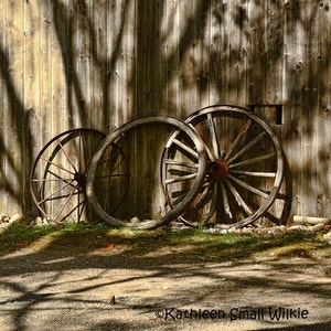 antique wagon wheels,rustic wagon wheels,old wagon wheels,metal and wood wagon wheels,unique gift,gift idea,wall art,home decor,Etsy find