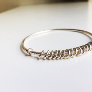 Silver Rattle Bangle image 1