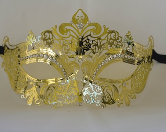 Gold laser cut masquerade mask for masquerade ball parties, new years masquerade ball parties and prom parties mask