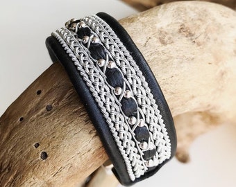 Traditional Nordic leather cuffs, with pewter threads braiding and sterling silver beads.