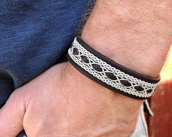 Traditional reindeer leather Sami bracelet, with pewter threads braids and pewter Celtic knot button.