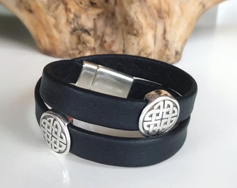 Wrap around reindeer leather bracelet with a magnetic clasp and two Celtic disc silver sliders.