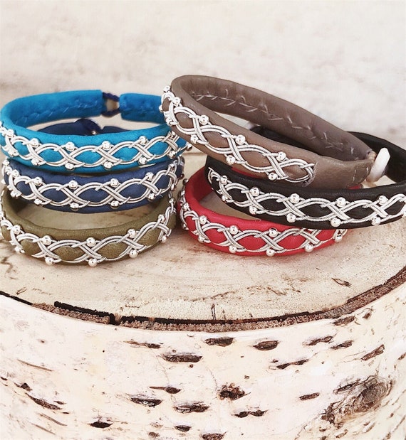 Sami inspired reindeer leather bracelet with sterling silver beads and spun pewter threads braid.