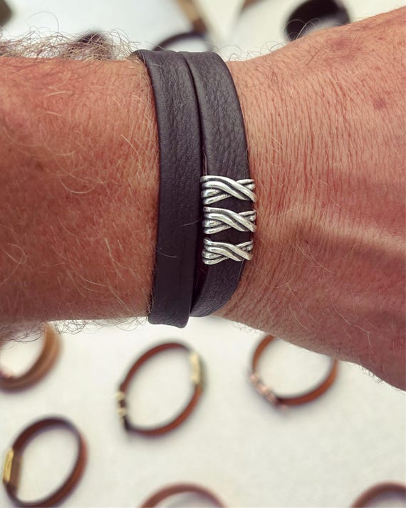 Wrap around reindeer leather bracelet with a magnetic clasp and 3 X silver sliders.