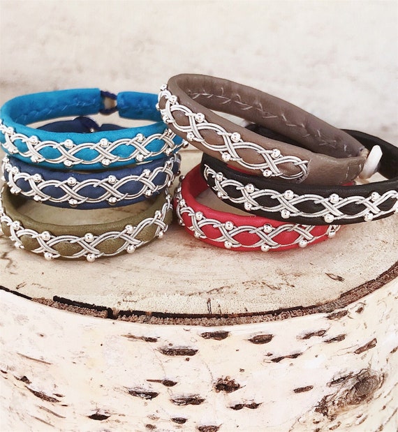 Sami reindeer leather bracelets with sterling silver beads.