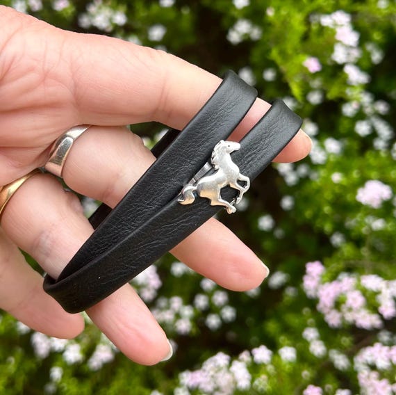 Wrap around reindeer leather bracelet with a magnetic clasp and silver horse slider. Unisex leather accessory. ONLY ONE BRACELET included.