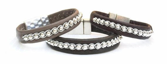 Nordic leather bracelets with a braid of pewter threads and sterling silver beads in a row. Handmade to order.