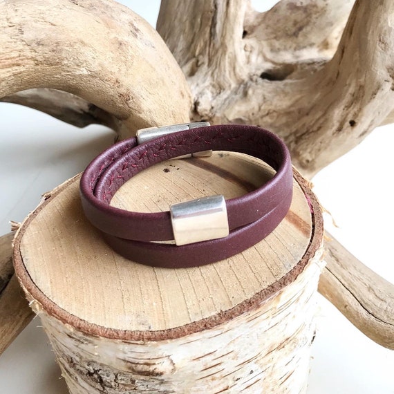 Men's double wrap around reindeer leather bracelet with a magnetic clasp and a rectangular silver slider. Only one wrap included in listing.