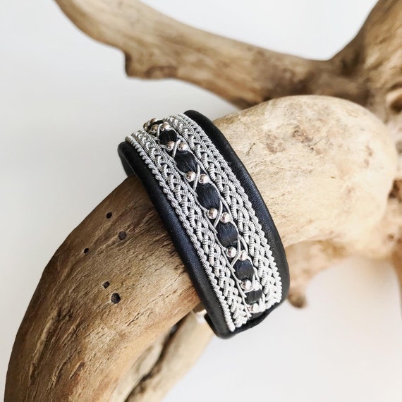 Traditional Nordic leather cuffs, with pewter threads braiding and sterling silver beads.