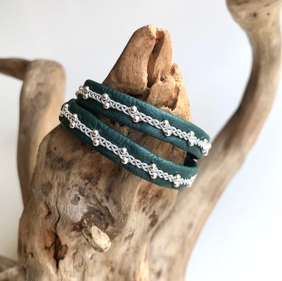 Sami inspired double wrap around leather bracelet with pewter threads and sterling silver beads. Handmade to order.