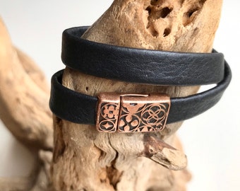 Wrap around reindeer leather bracelet with an intricate magnetic rose gold magnetic clasp.