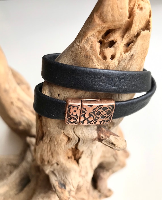 Wrap around reindeer leather bracelet with an intricate magnetic rose gold magnetic clasp.
