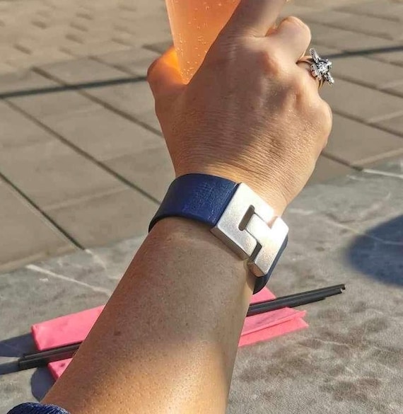 Wide Scandinavian cuff with magnetic clasp in bright coloured reindeer leather.