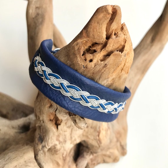 Traditional Scandinavian Viking cuff in reindeer leather and pewter.