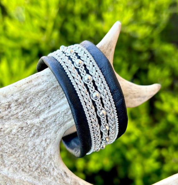 Wide Nordic reindeer leather bracelets, with traditional pewter braiding, sterling silver beads and twisted borders.