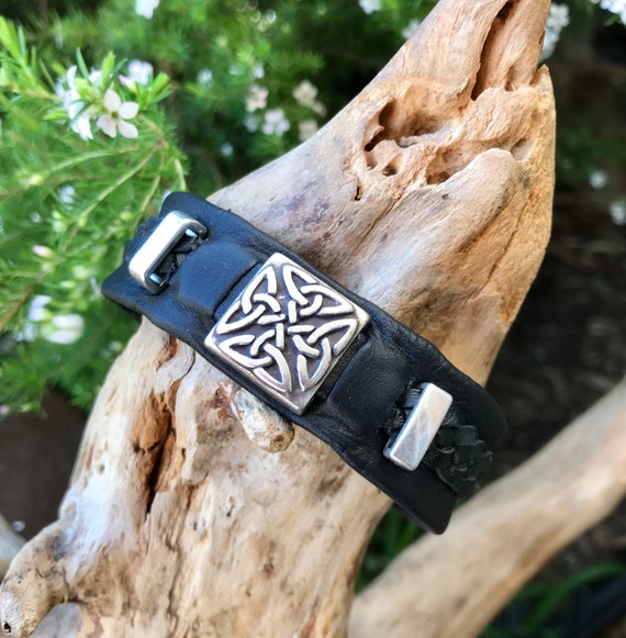 Unisex leather cuff with Trinity Celtic feature.