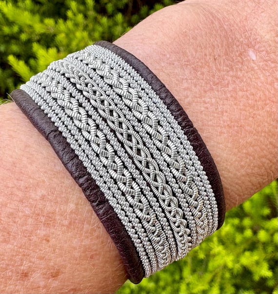 Nordic leather cuff, Sami inspired with traditional pewter and silver thread braiding. Handmade to order unisex accessory.