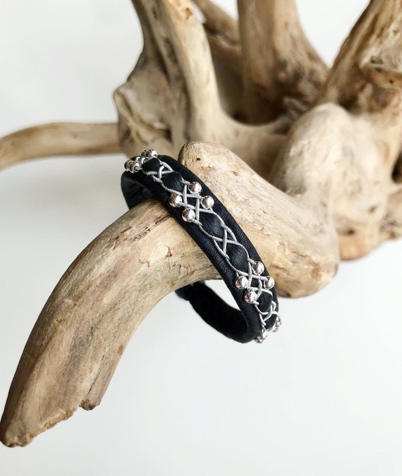Nordic reindeer leather bracelets with sterling silver beads. A Sami inspired accessory with a nickel free magnetic clasp.
